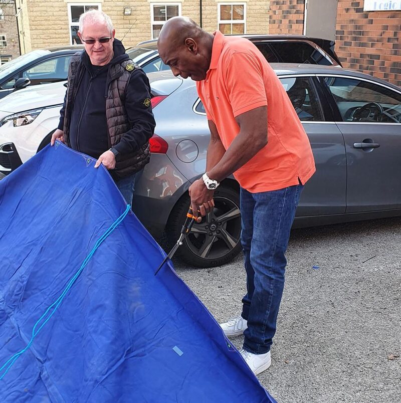 Frank Bruno cutting the canvas