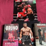 2 signed books signed images